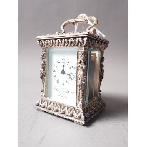 262 - A commemorative Silver Jubilee miniature silver relief cased carriage clock by Charles Frodsham, Lon... 