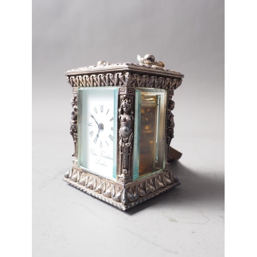 263 - A commemorative Silver Jubilee miniature silver relief cased carriage clock by Charles Frodsham, Lon... 