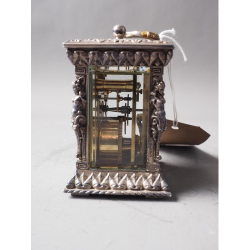 263 - A commemorative Silver Jubilee miniature silver relief cased carriage clock by Charles Frodsham, Lon... 