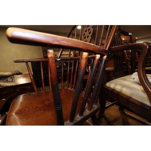 420 - A 19th century Windsor wheelback elbow chair with elm panel seat, on turned and stretchered supports