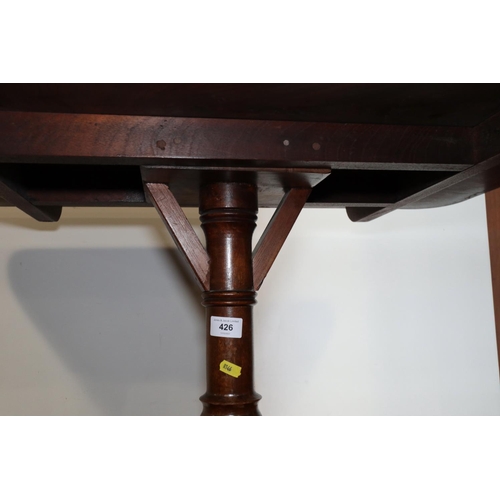 426 - A 19th century mahogany rectangular top occasional table, on turned column and tripod scroll support... 