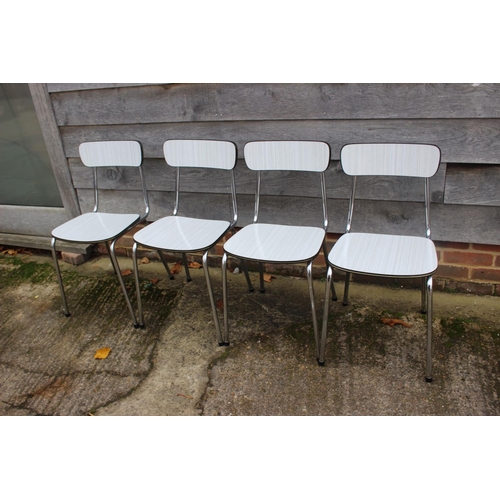 470 - A set of four 1960's chrome and grey and white striped laminate kitchen chairs