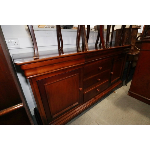 484 - A Grange cherrywood sideboard, fitted three drawers over cupboards with further central drawers and ... 