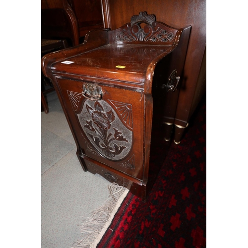 486 - An Edwardian carved mahogany coal purdonium with fall front, 13 1/2