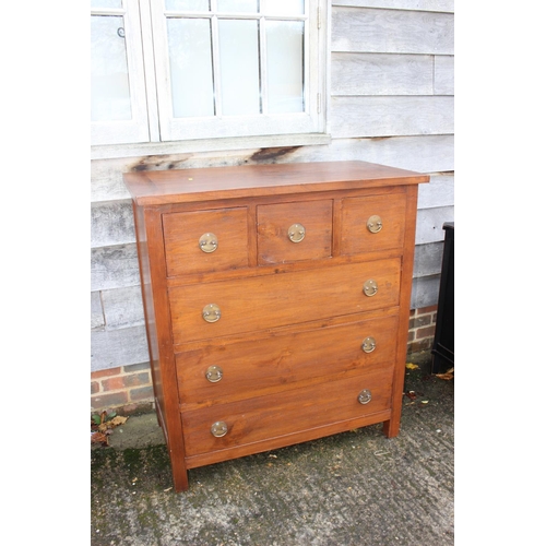 557 - A modern hardwood chest of three short and three long drawers with ring handles, 39 1/2