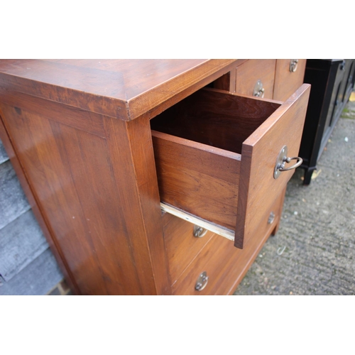 557 - A modern hardwood chest of three short and three long drawers with ring handles, 39 1/2