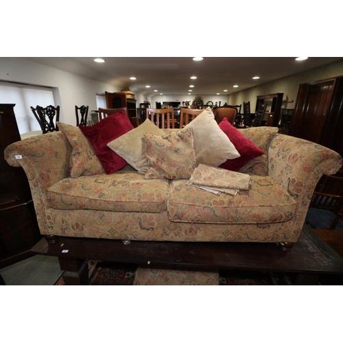 504 - A chesterfield type settee with loose seat and back cushions, upholstered in a floral tapestry, 74