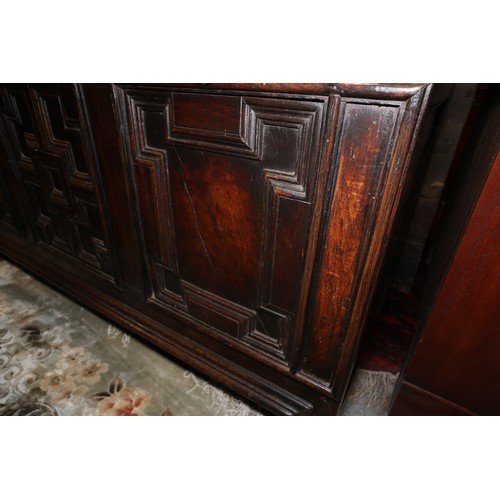 408 - An 18th century three fielded panel front coffer, 54