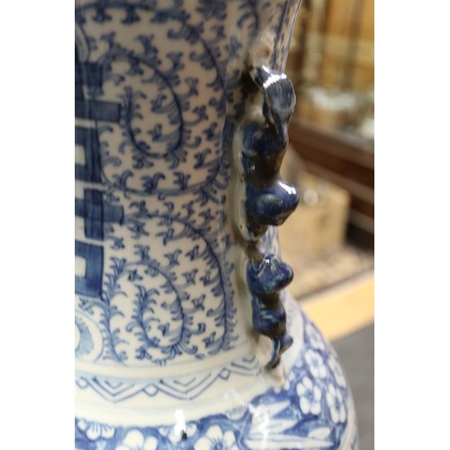 190 - A pair of late 19th century Chinese blue and white porcelain two-handled vases with symbol and scrol... 