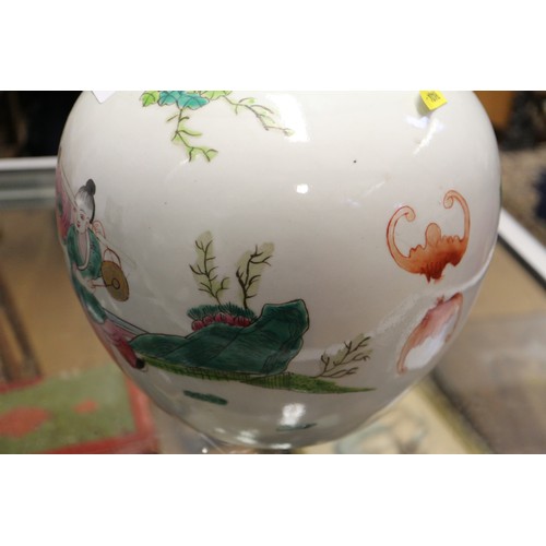 62 - A Canton enamel vase with floral decoration, 19