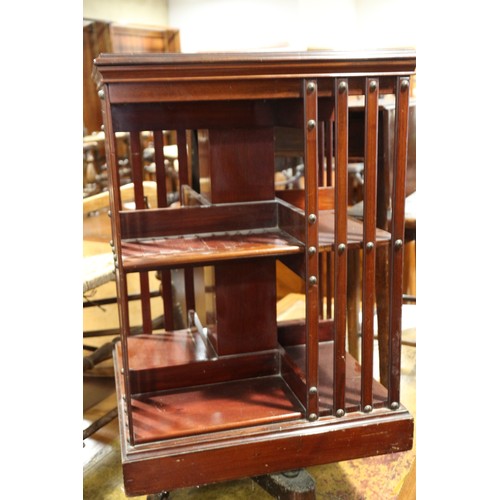 485 - A mahogany revolving bookcase, 20