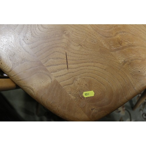 531 - An Ercol natural elm 