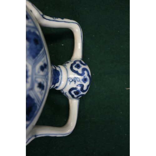 59 - A Chinese porcelain blue and white moon flask with all-over geometric and scroll decoration, 8