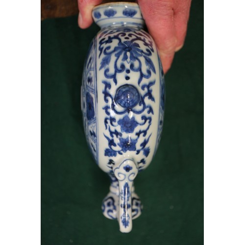 59 - A Chinese porcelain blue and white moon flask with all-over geometric and scroll decoration, 8