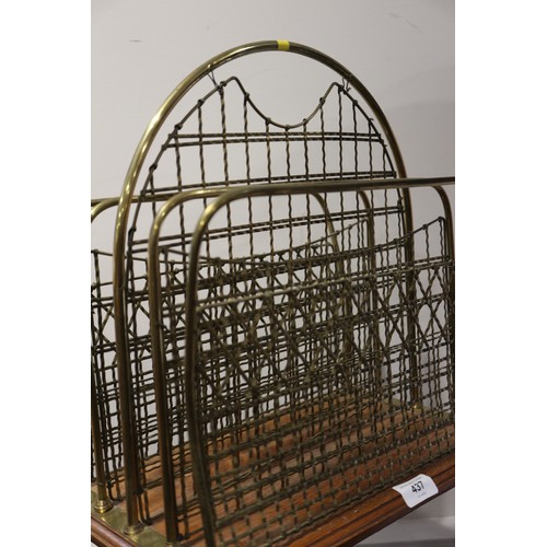 437 - A late Victorian brass wirework magazine stand, on tripod splay supports, 35