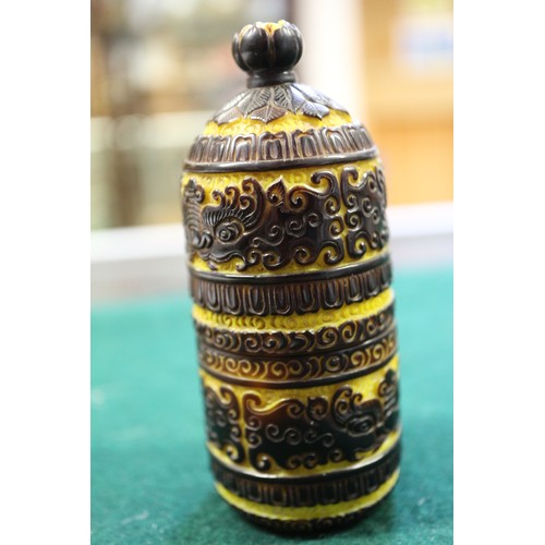 70 - A Chinese Peking glass snuff bottle with scrolled and bat decoration, 3 3/4