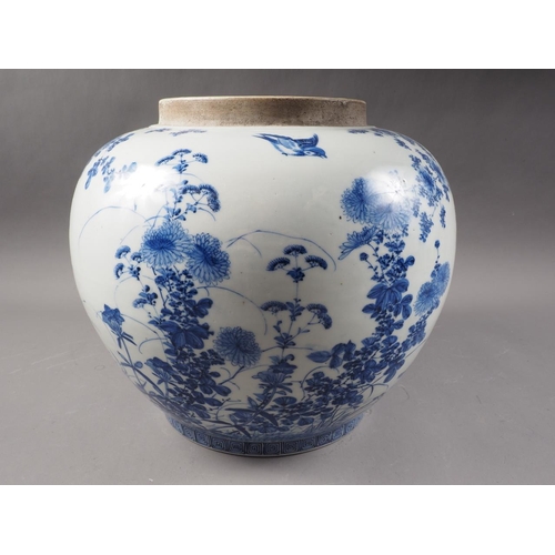 62 - A Chinese porcelain blue and white jar with chrysanthemum and bird decoration, 10 1/2