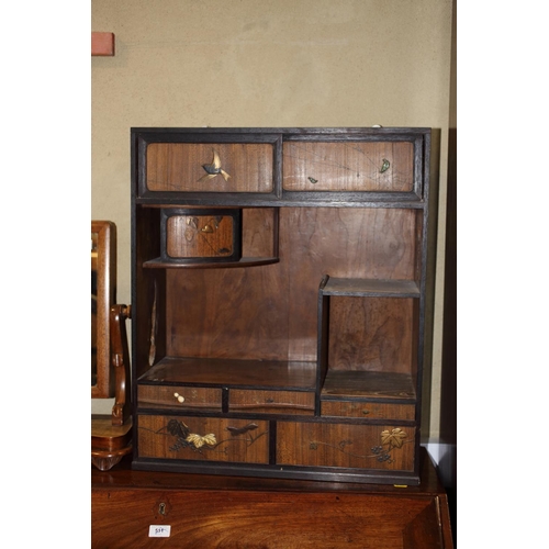 262 - A late 19th century Japanese lacquer and inlaid cabinet, fitted sliding doors over recess, three sma... 