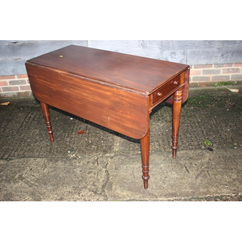 263 - A Cuban mahogany Pembroke table fitted two drawers on turned, ringed and tapered supports, 42 1/2