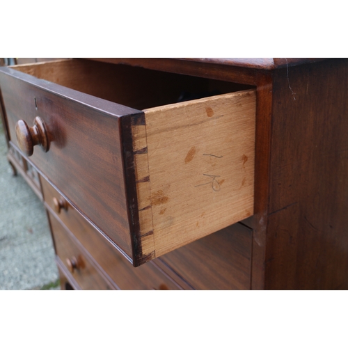 264 - A mid 19th century mahogany chest of two short and three long graduated drawers with knob handles, o... 