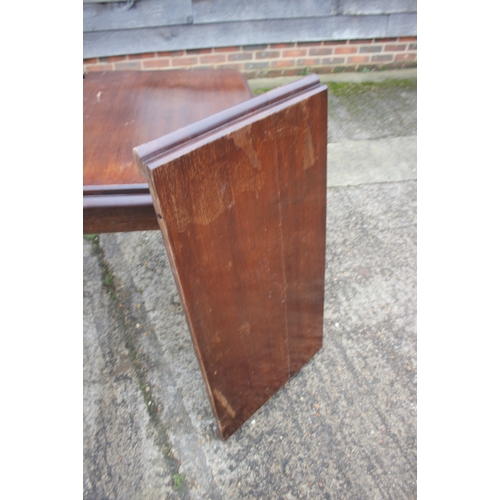 285 - A Victorian oak and mahogany rectangular top wind-out dining table with one extra leaf, on reeded an... 