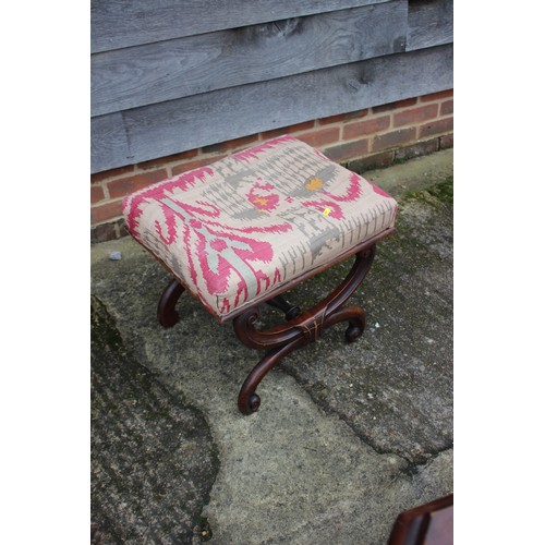 284 - A mahogany 'X' frame stool, upholstered in a kelim style fabric, with turned stretcher