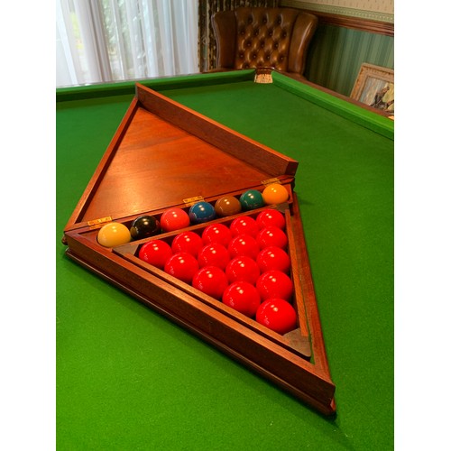 261 - A Cox and Yemen late Victorian mahogany billiard table, on faceted supports, complete with cues, res... 