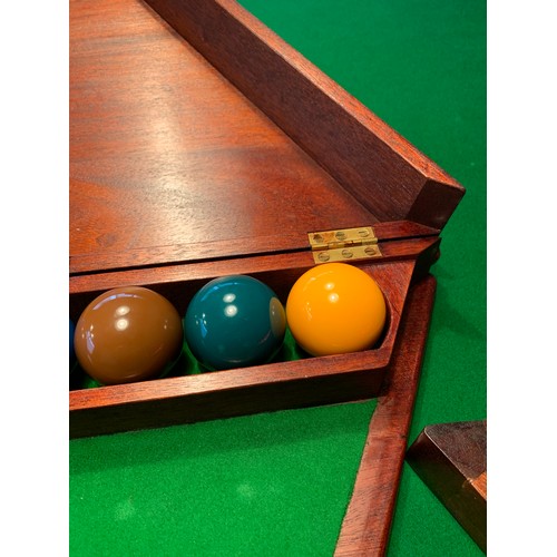 261 - A Cox and Yemen late Victorian mahogany billiard table, on faceted supports, complete with cues, res... 