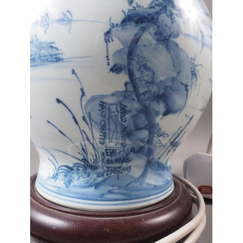 158 - An Oxford delftware bottle vase, now converted as a table lamp, 20