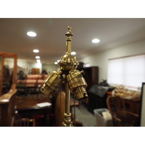 161 - An Edwardian brass adjustable standard lamp with reeded column and square base with ball and claw su... 