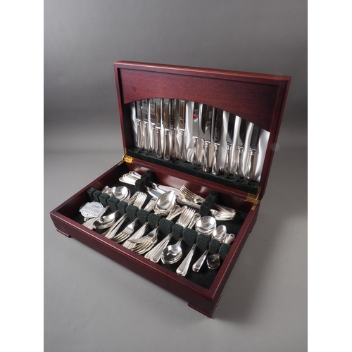 172 - A Butler of Sheffield silver plated bead pattern canteen of cutlery, in mahogany case