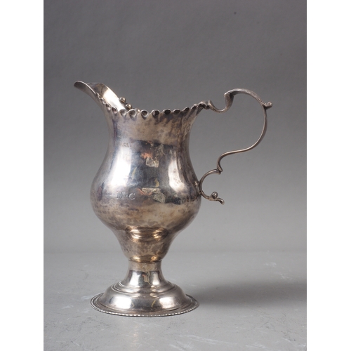 179 - A Georgian silver pedestal cream jug, 3oz troy approx