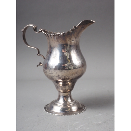 179 - A Georgian silver pedestal cream jug, 3oz troy approx