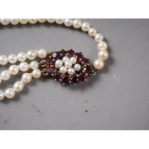 192 - A 9ct gold, garnet and seed pearl choker, and a matching three-strand bracelet