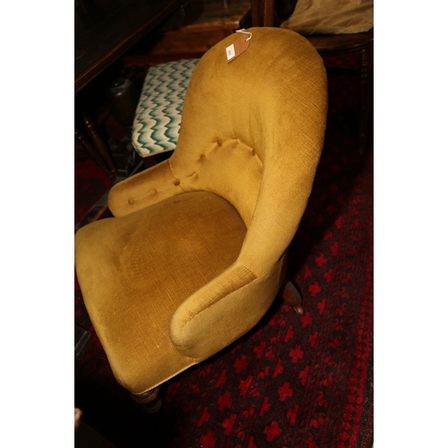 265 - A late 19th century tub chair, button upholstered in an old gold Dralon, on turned and castored supp... 