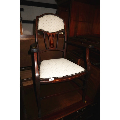 315 - An Edwardian mahogany and inlaid armchair and an oak square top two-tier occasional table