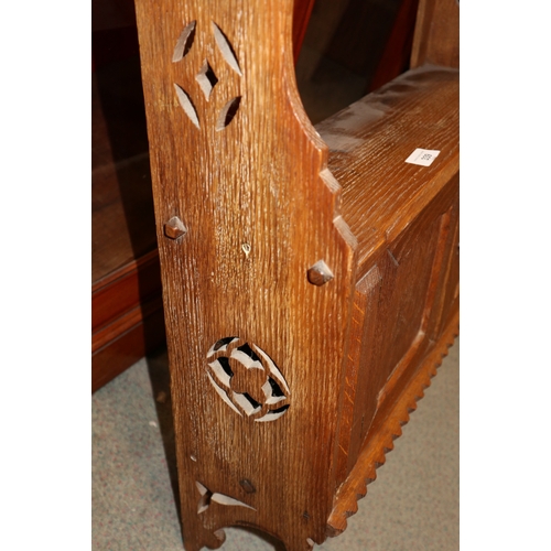 339 - An early 20th century oak wall cupboard, fitted shelf over two doors, 20