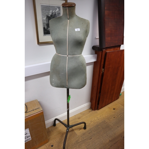 360 - A dressmaker's mannequin, on metal tripod support, 63