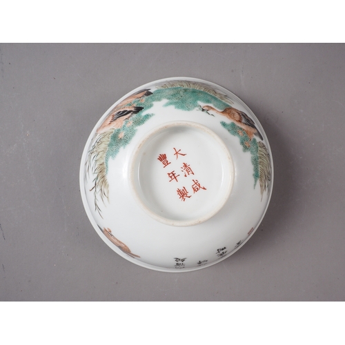 67 - A Chinese porcelain bowl with birds in a landscape and verse decoration, and interior peach decorati... 