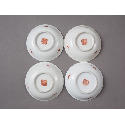 76 - A set of four Chinese porcelain dishes with bat and precious object decoration, all with seal marks ... 