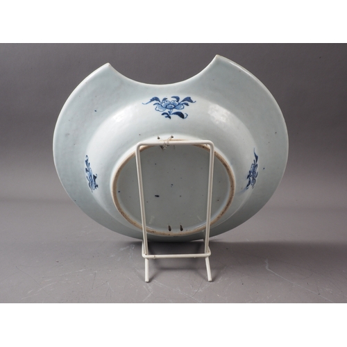 82 - A Chinese blue and white porcelain shaving bowl with precious objects decoration, 11