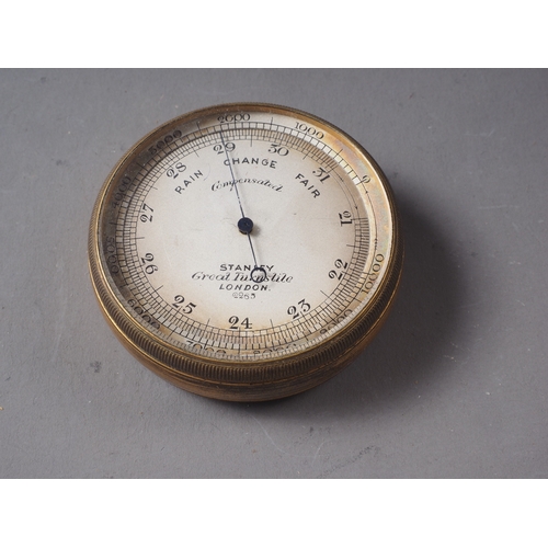 89 - A Stanley brass cased pocket barometer, in Morocco leather case