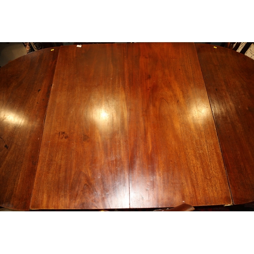 271 - An early 19th century 'D' end dining table with centre drop leaf section and extra leaf, on square t... 