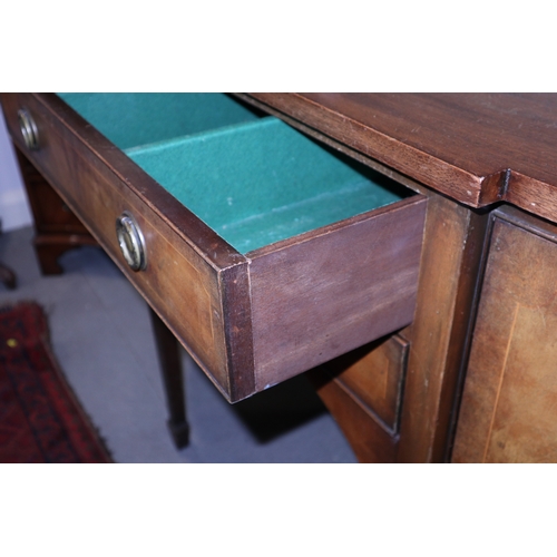 317 - An Edwardian mahogany break bowfront sideboard, fitted two central drawers and flanked cupboards, on... 