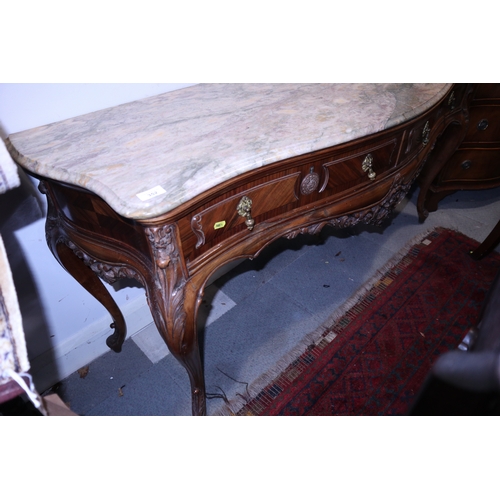 352 - A French style carved walnut serpentine front side table with marble top over two drawers, on cabrio... 