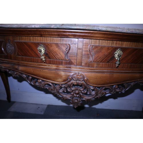 352 - A French style carved walnut serpentine front side table with marble top over two drawers, on cabrio... 