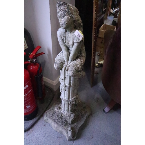 386 - A cast stone garden statue, 