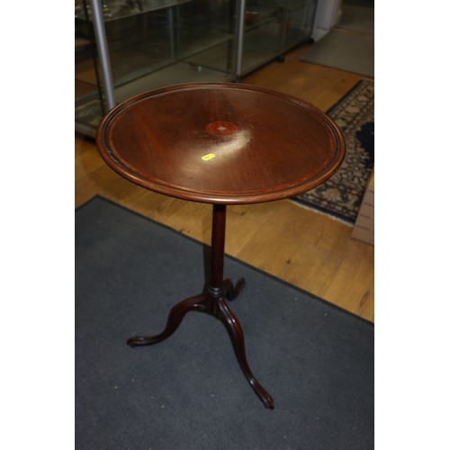 287 - An Edwardian mahogany, satinwood banded and inlaid wine table, on slender column and carved tripod s... 