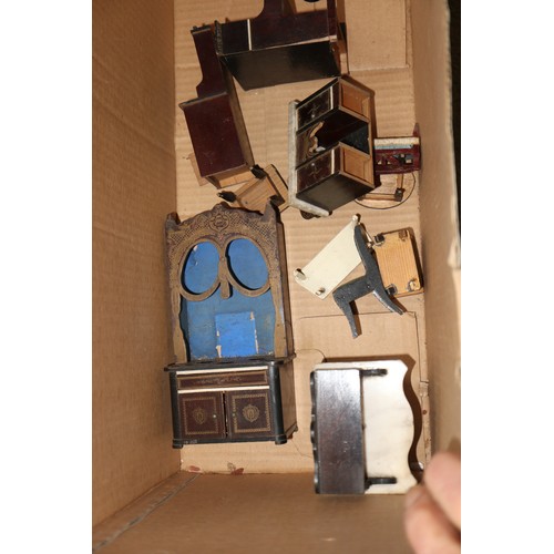 135 - A small collection of wooden doll's house furniture, 