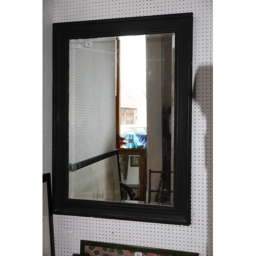 293 - A bevelled plate wall mirror, in beaded ebonised frame, 42